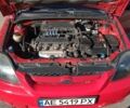 Красный Киа Рио, объемом двигателя 1.34 л и пробегом 280 тыс. км за 3200 $, фото 1 на Automoto.ua
