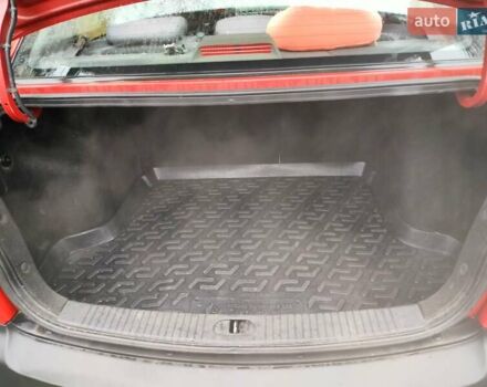 Красный Киа Рио, объемом двигателя 1.34 л и пробегом 243 тыс. км за 4500 $, фото 6 на Automoto.ua