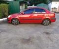 Красный Киа Рио, объемом двигателя 1.4 л и пробегом 97 тыс. км за 7000 $, фото 1 на Automoto.ua