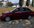 Красный Киа Рио, объемом двигателя 1.4 л и пробегом 255 тыс. км за 2806 $, фото 1 на Automoto.ua