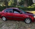 Красный Киа Рио, объемом двигателя 1.4 л и пробегом 255 тыс. км за 2806 $, фото 2 на Automoto.ua