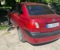 Красный Киа Рио, объемом двигателя 1.4 л и пробегом 249 тыс. км за 2600 $, фото 2 на Automoto.ua