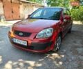 Червоний Кіа Ріо, об'ємом двигуна 1.4 л та пробігом 215 тис. км за 4600 $, фото 13 на Automoto.ua