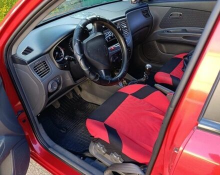 Красный Киа Рио, объемом двигателя 1.4 л и пробегом 97 тыс. км за 7000 $, фото 2 на Automoto.ua