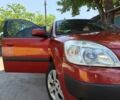 Красный Киа Рио, объемом двигателя 1.4 л и пробегом 215 тыс. км за 4625 $, фото 1 на Automoto.ua