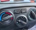 Червоний Кіа Ріо, об'ємом двигуна 1.4 л та пробігом 215 тис. км за 4600 $, фото 2 на Automoto.ua