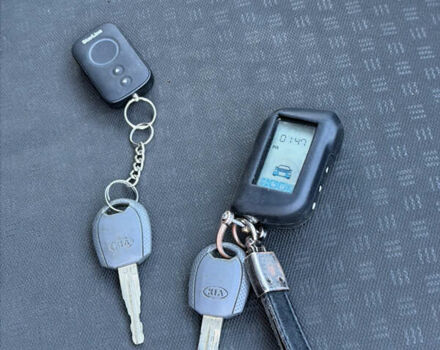 Червоний Кіа Ріо, об'ємом двигуна 1.4 л та пробігом 154 тис. км за 4200 $, фото 16 на Automoto.ua