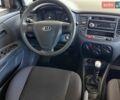Червоний Кіа Ріо, об'ємом двигуна 1.4 л та пробігом 190 тис. км за 4600 $, фото 9 на Automoto.ua
