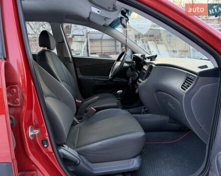 Червоний Кіа Ріо, об'ємом двигуна 1.4 л та пробігом 154 тис. км за 4200 $, фото 9 на Automoto.ua