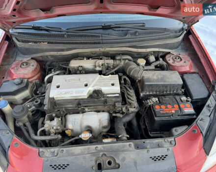 Червоний Кіа Ріо, об'ємом двигуна 1.4 л та пробігом 154 тис. км за 4200 $, фото 15 на Automoto.ua