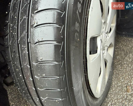 Червоний Кіа Ріо, об'ємом двигуна 1.4 л та пробігом 154 тис. км за 3600 $, фото 14 на Automoto.ua