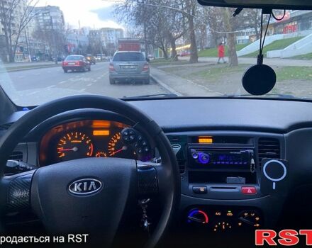 Червоний Кіа Ріо, об'ємом двигуна 1.4 л та пробігом 207 тис. км за 5100 $, фото 3 на Automoto.ua