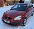 Червоний Кіа Ріо, об'ємом двигуна 1.4 л та пробігом 154 тис. км за 3950 $, фото 1 на Automoto.ua