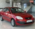 Червоний Кіа Ріо, об'ємом двигуна 1.4 л та пробігом 190 тис. км за 4600 $, фото 1 на Automoto.ua