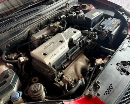 Червоний Кіа Ріо, об'ємом двигуна 1.4 л та пробігом 136 тис. км за 4200 $, фото 4 на Automoto.ua