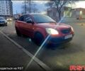 Червоний Кіа Ріо, об'ємом двигуна 1.4 л та пробігом 207 тис. км за 5100 $, фото 2 на Automoto.ua