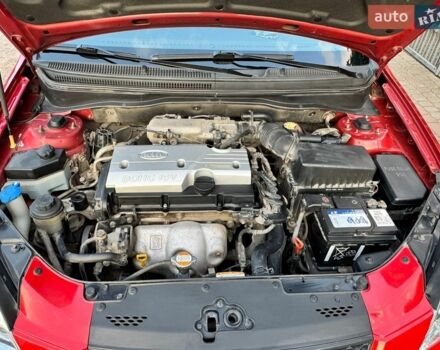 Червоний Кіа Ріо, об'ємом двигуна 1.4 л та пробігом 69 тис. км за 6400 $, фото 8 на Automoto.ua