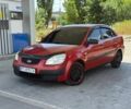 Красный Киа Рио, объемом двигателя 1.4 л и пробегом 298 тыс. км за 3650 $, фото 1 на Automoto.ua