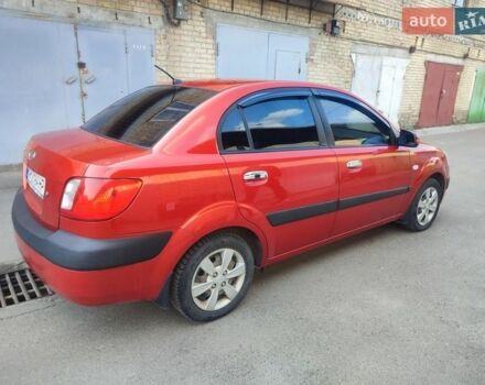 Червоний Кіа Ріо, об'ємом двигуна 1.4 л та пробігом 185 тис. км за 4500 $, фото 8 на Automoto.ua