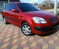 Червоний Кіа Ріо, об'ємом двигуна 1.4 л та пробігом 137 тис. км за 4600 $, фото 1 на Automoto.ua