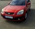 Красный Киа Рио, объемом двигателя 1.4 л и пробегом 171 тыс. км за 5000 $, фото 1 на Automoto.ua