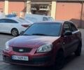 Червоний Кіа Ріо, об'ємом двигуна 1.4 л та пробігом 243 тис. км за 3400 $, фото 1 на Automoto.ua