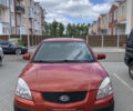 Красный Киа Рио, объемом двигателя 1.5 л и пробегом 277 тыс. км за 3400 $, фото 1 на Automoto.ua