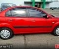 Красный Киа Рио, объемом двигателя 1.4 л и пробегом 171 тыс. км за 5000 $, фото 3 на Automoto.ua
