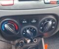 Красный Киа Рио, объемом двигателя 1.4 л и пробегом 187 тыс. км за 4500 $, фото 14 на Automoto.ua