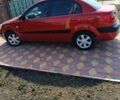 Червоний Кіа Ріо, об'ємом двигуна 1.4 л та пробігом 137 тис. км за 4600 $, фото 13 на Automoto.ua