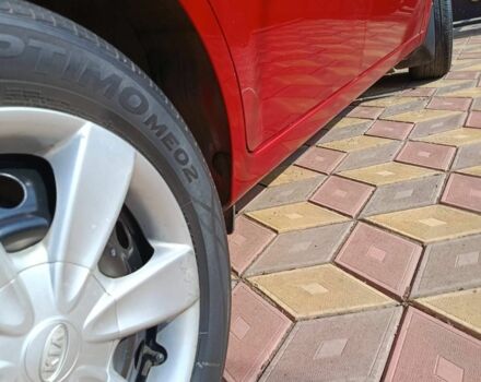 Червоний Кіа Ріо, об'ємом двигуна 1.4 л та пробігом 137 тис. км за 4600 $, фото 12 на Automoto.ua