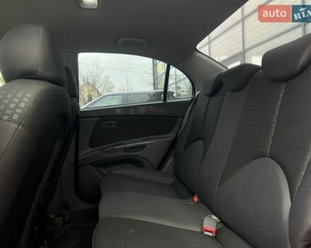 Красный Киа Рио, объемом двигателя 1.4 л и пробегом 274 тыс. км за 4100 $, фото 14 на Automoto.ua