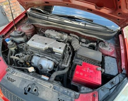 Красный Киа Рио, объемом двигателя 1.4 л и пробегом 119 тыс. км за 5100 $, фото 6 на Automoto.ua