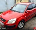 Красный Киа Рио, объемом двигателя 1.5 л и пробегом 198 тыс. км за 3999 $, фото 1 на Automoto.ua