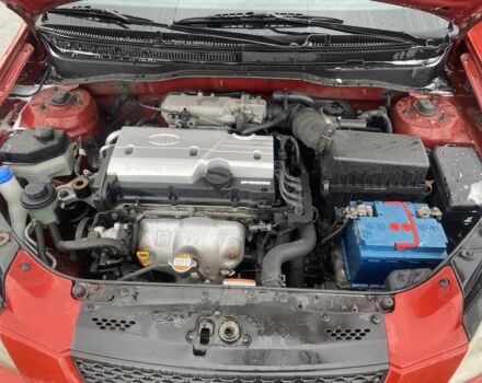 Красный Киа Рио, объемом двигателя 1.4 л и пробегом 290 тыс. км за 3500 $, фото 3 на Automoto.ua