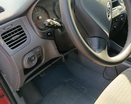 Червоний Кіа Ріо, об'ємом двигуна 1.4 л та пробігом 137 тис. км за 4600 $, фото 10 на Automoto.ua