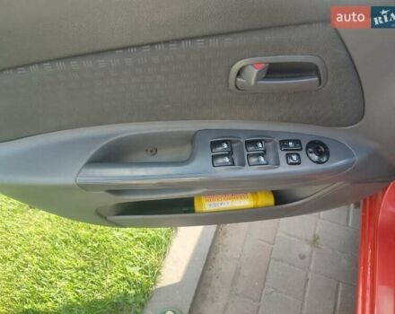 Червоний Кіа Ріо, об'ємом двигуна 1.4 л та пробігом 182 тис. км за 4500 $, фото 13 на Automoto.ua