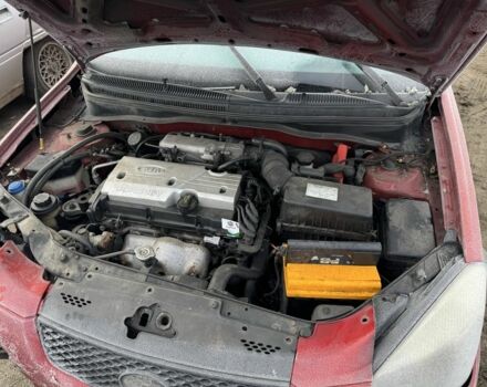 Красный Киа Рио, объемом двигателя 1.4 л и пробегом 240 тыс. км за 1500 $, фото 1 на Automoto.ua