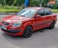 Красный Киа Рио, объемом двигателя 1.4 л и пробегом 240 тыс. км за 3750 $, фото 1 на Automoto.ua