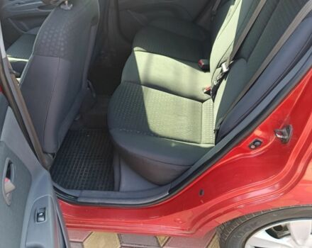 Червоний Кіа Ріо, об'ємом двигуна 1.4 л та пробігом 137 тис. км за 4600 $, фото 9 на Automoto.ua