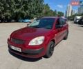 Красный Киа Рио, объемом двигателя 1.4 л и пробегом 240 тыс. км за 3700 $, фото 1 на Automoto.ua