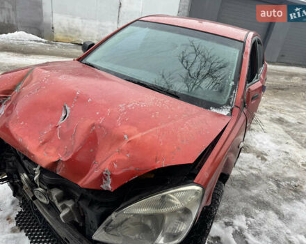 Червоний Кіа Ріо, об'ємом двигуна 1.4 л та пробігом 240 тис. км за 1750 $, фото 3 на Automoto.ua