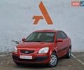 Красный Киа Рио, объемом двигателя 1.4 л и пробегом 100 тыс. км за 6990 $, фото 1 на Automoto.ua