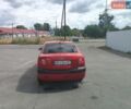 Червоний Кіа Ріо, об'ємом двигуна 1.4 л та пробігом 187 тис. км за 4400 $, фото 6 на Automoto.ua