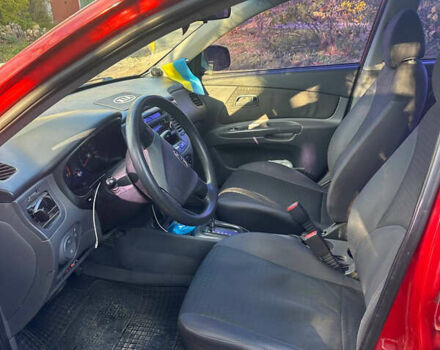 Красный Киа Рио, объемом двигателя 1.4 л и пробегом 215 тыс. км за 4100 $, фото 14 на Automoto.ua
