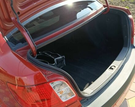 Червоний Кіа Ріо, об'ємом двигуна 1.4 л та пробігом 137 тис. км за 4600 $, фото 16 на Automoto.ua