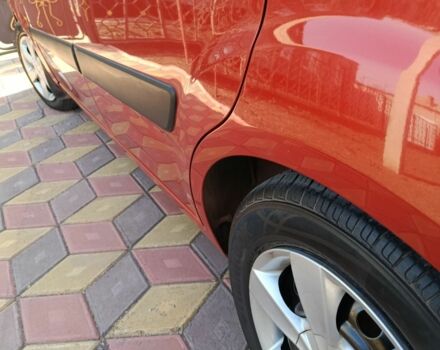 Червоний Кіа Ріо, об'ємом двигуна 1.4 л та пробігом 137 тис. км за 4600 $, фото 11 на Automoto.ua