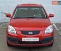 Красный Киа Рио, объемом двигателя 1.4 л и пробегом 100 тыс. км за 6990 $, фото 3 на Automoto.ua