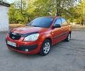 Красный Киа Рио, объемом двигателя 1.4 л и пробегом 205 тыс. км за 4100 $, фото 1 на Automoto.ua
