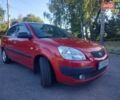 Червоний Кіа Ріо, об'ємом двигуна 1.4 л та пробігом 152 тис. км за 6000 $, фото 1 на Automoto.ua